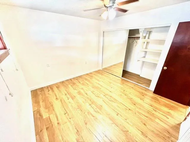 a bathroom with a sink a mirror and a toilet