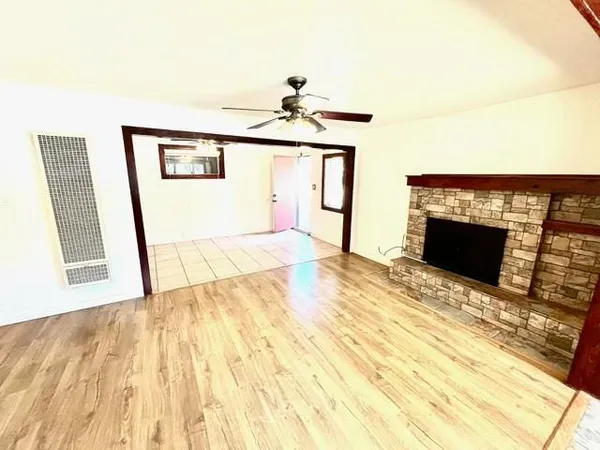 a kitchen with a stove a sink and a refrigerator