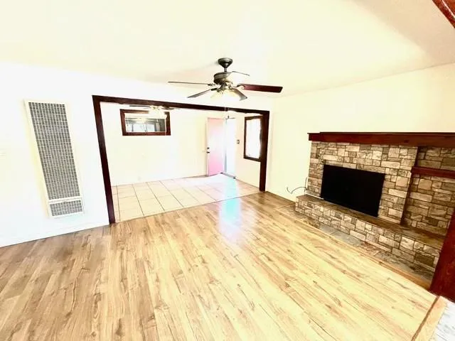 a kitchen with a stove a sink and a refrigerator