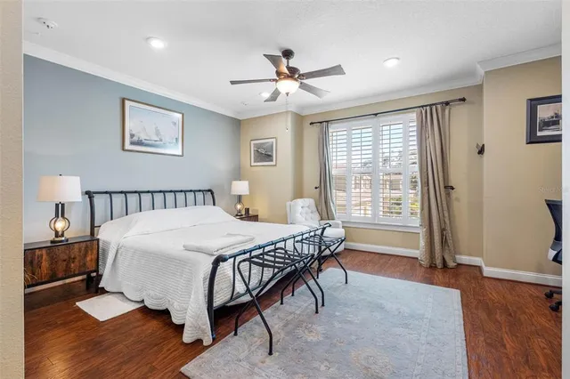 a bedroom with a bed and a table in it