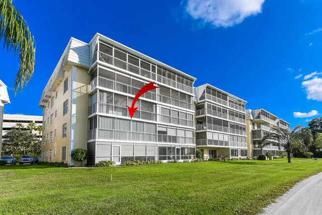 a view of building with yard