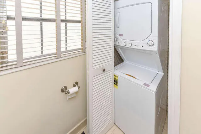 a view of balcony with furniture