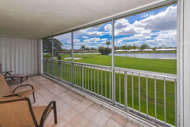 a view of a golf course with a lake