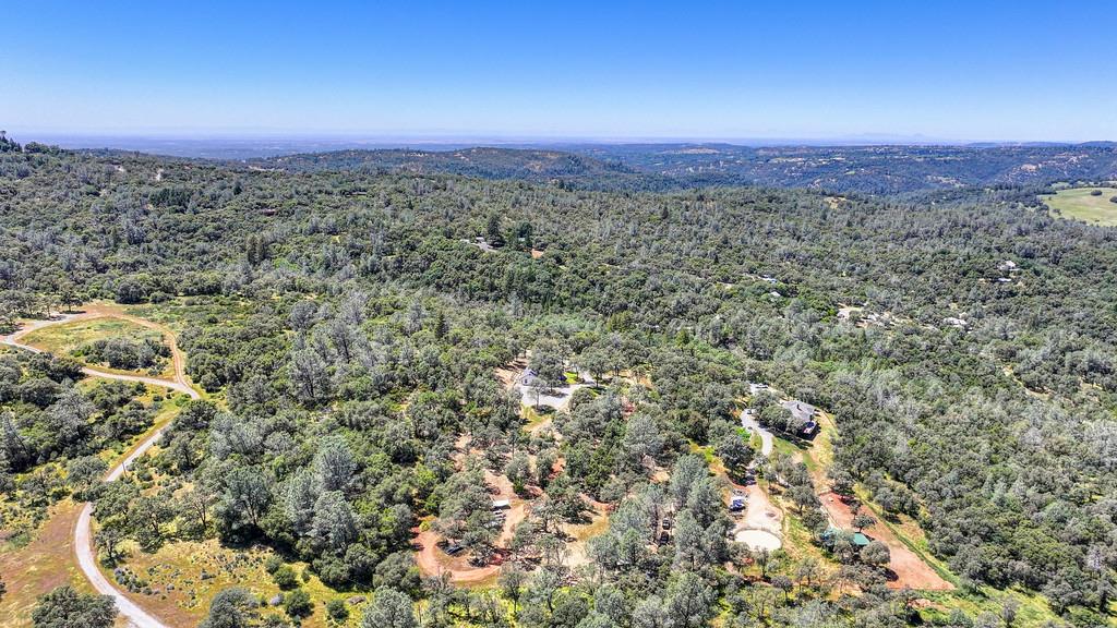 3154 Twin K Road Pilot Hill, CA 95664 - Photo 88 of 89 a view of a city with lush green forest