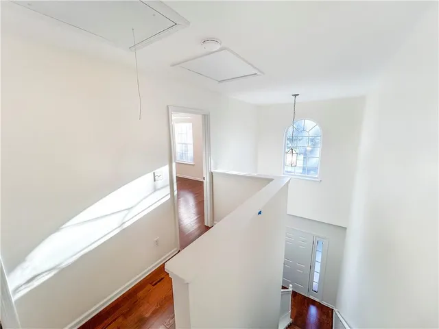 a view of a living room with windows