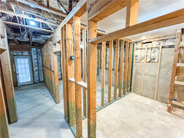 a view of a bathroom with a shower and a tub