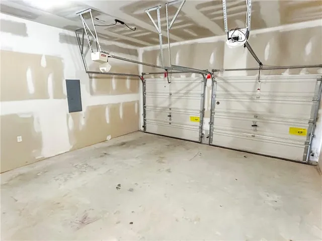 a view of a room with cabinet and windows