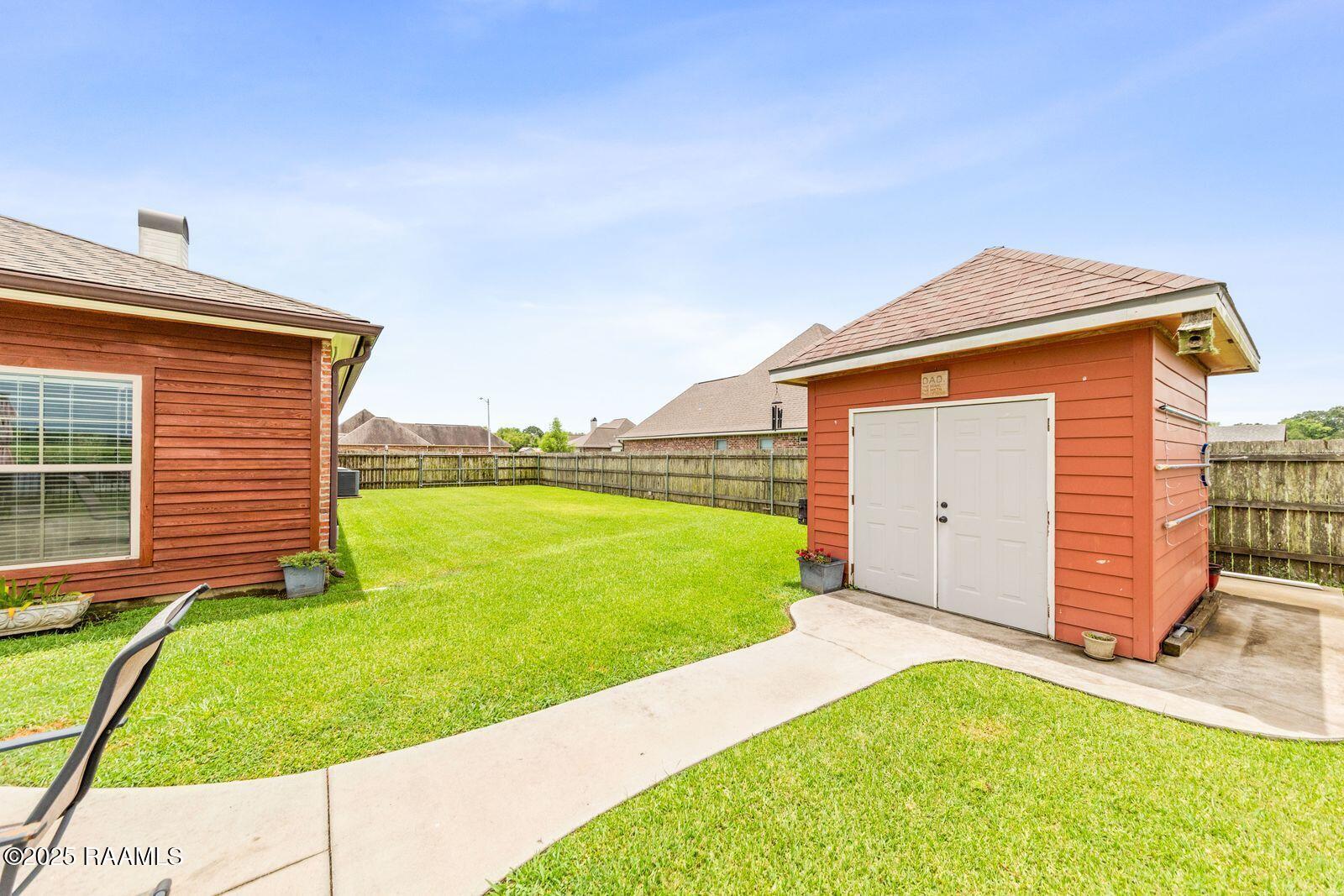 1181 Grand Loop Breaux Bridge, LA 70517 - Photo 24 of 40 Spacious side yard with double gate acce