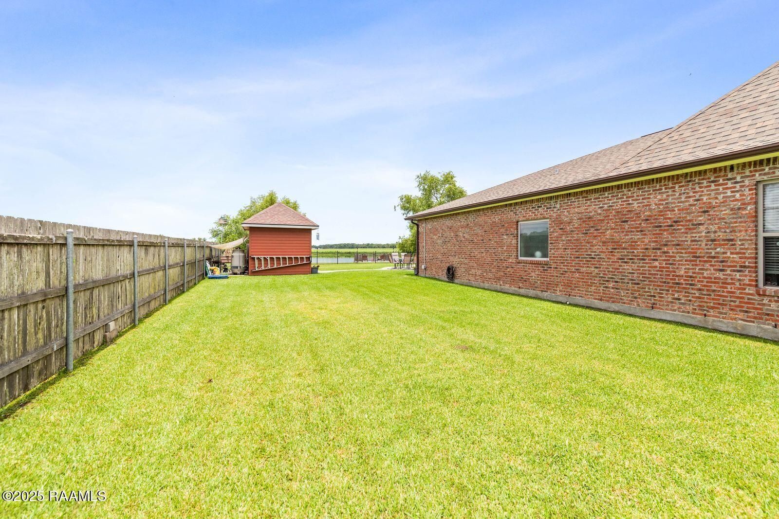 1181 Grand Loop Breaux Bridge, LA 70517 - Photo 25 of 40 Double gate access
