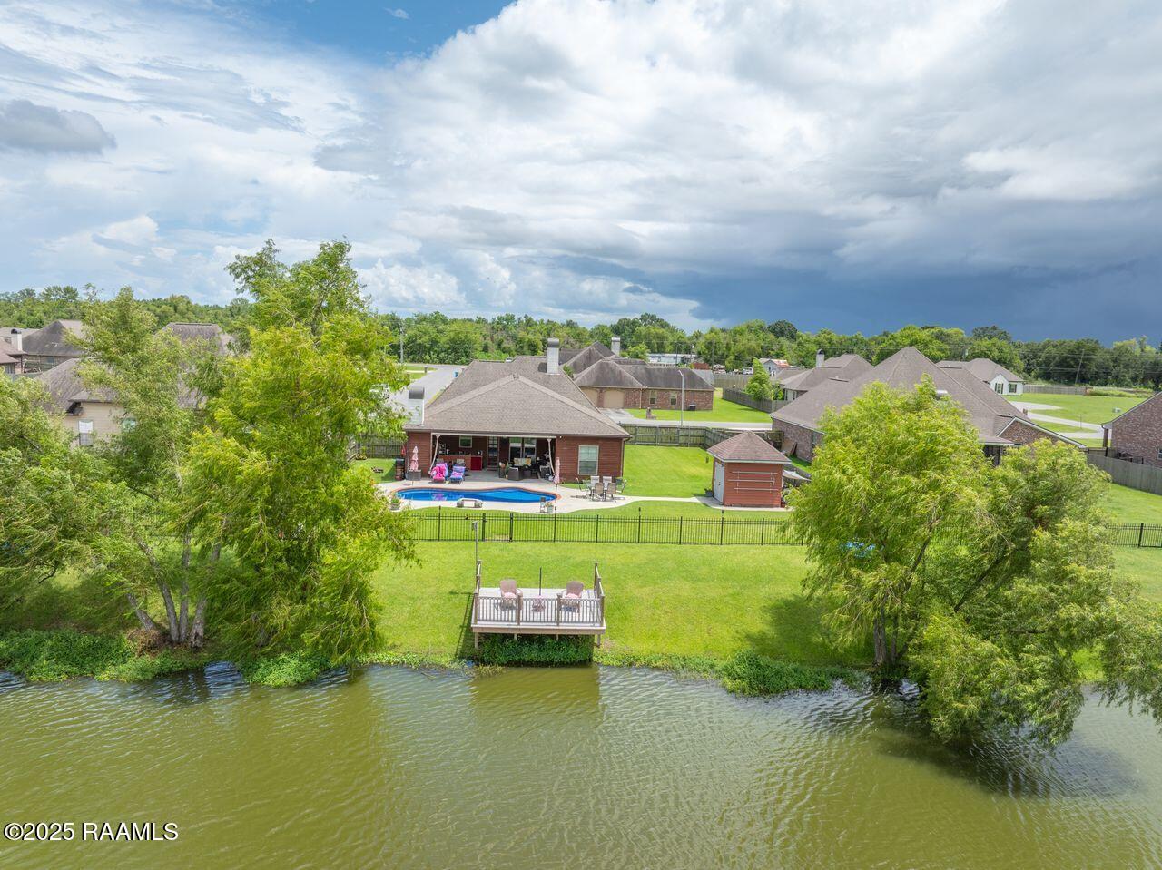 1181 Grand Loop Breaux Bridge, LA 70517 - Photo 37 of 40 Aerial _Pool & Pond