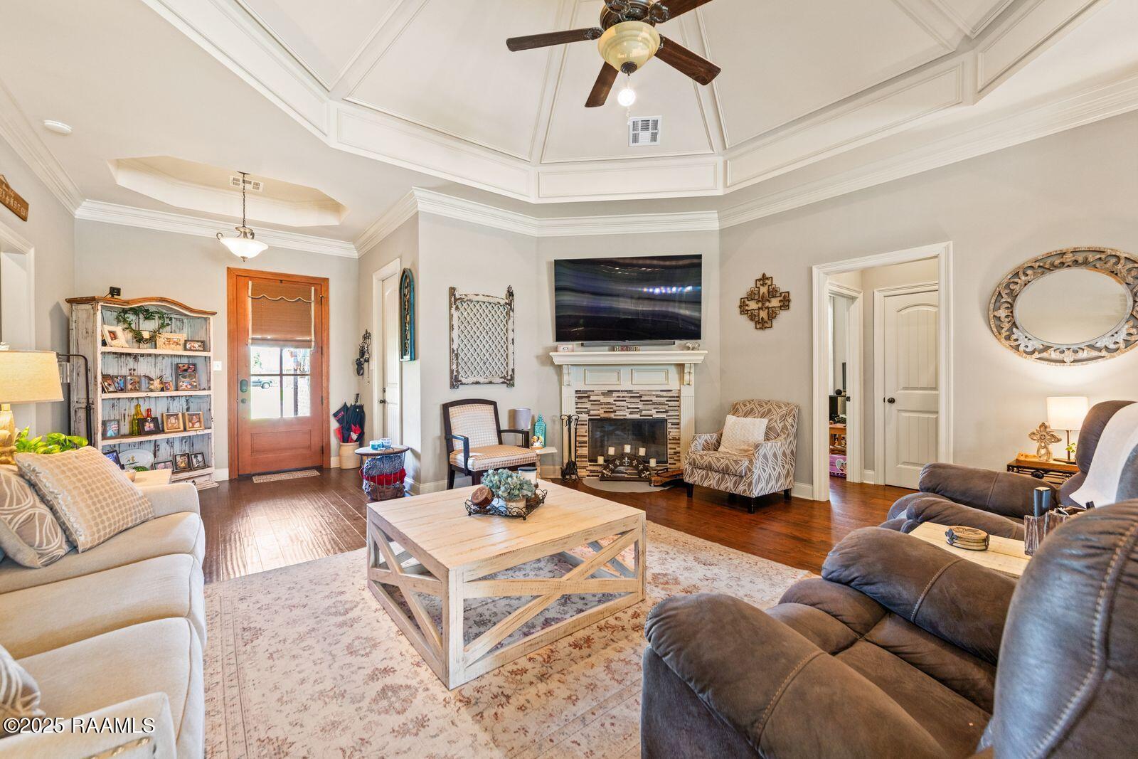 1181 Grand Loop Breaux Bridge, LA 70517 - Photo 5 of 40 Living room features wood burning firepl