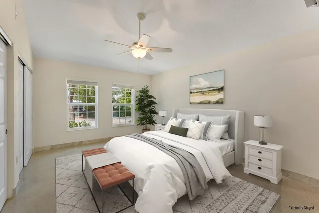 a bed room with a bed and a window