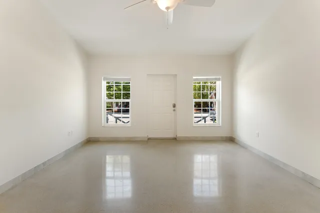 an empty room with windows