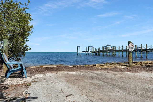 a view of a backyard with a chair