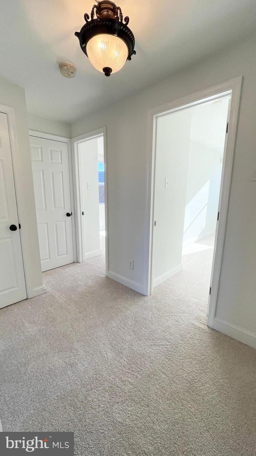 5358 Delmar Road Clifton Heights, PA 19018 - Photo 11 of 30 an empty room with a window and chandelier