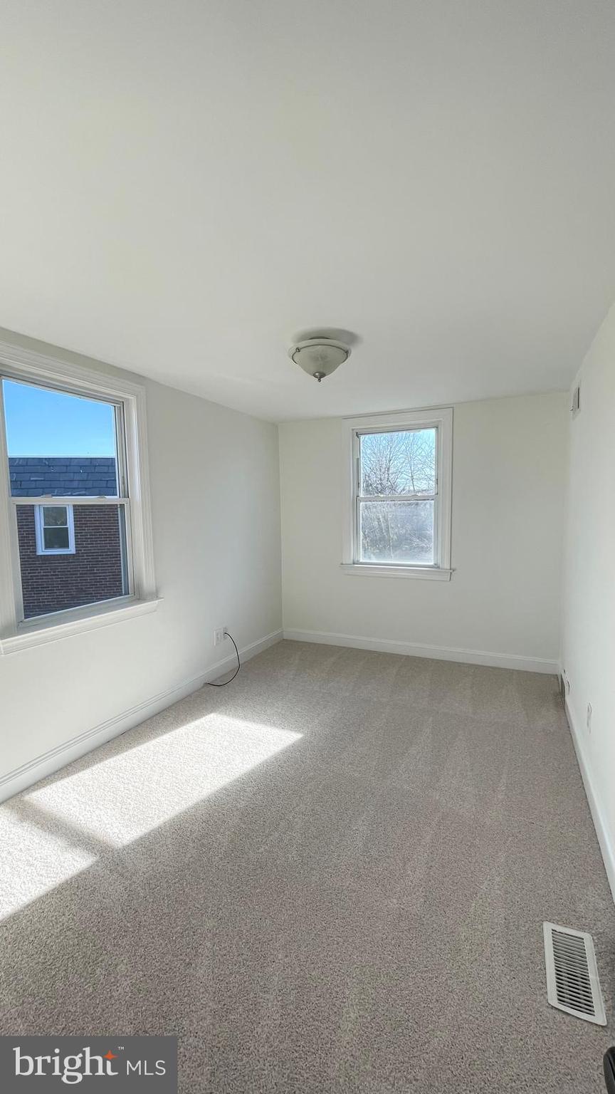 5358 Delmar Road Clifton Heights, PA 19018 - Photo 16 of 30 a view of an empty room with a window