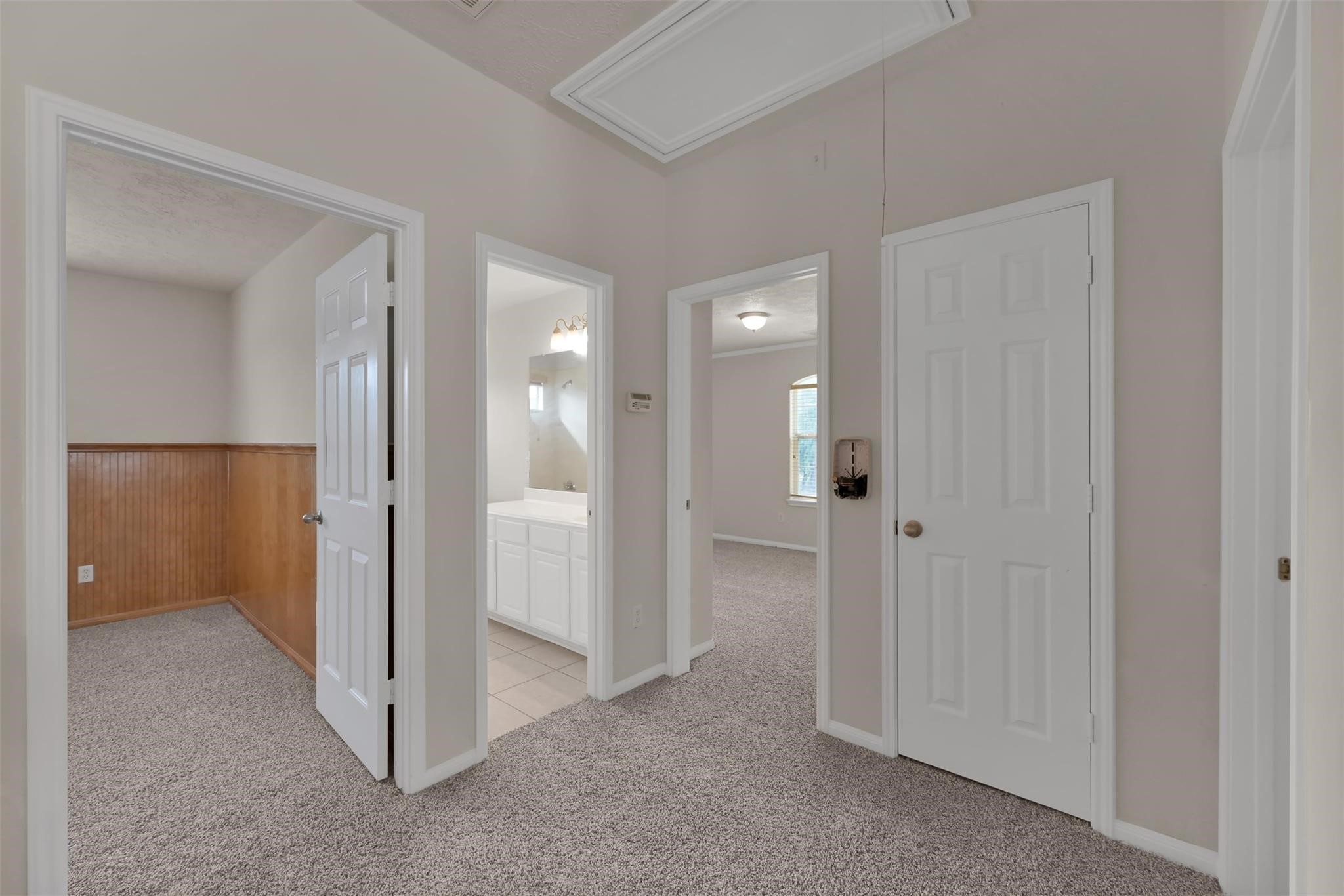 1443 Meadowhigh Lane Spring, TX 77373 - Photo 13 of 23 a view of a hallway with closet area