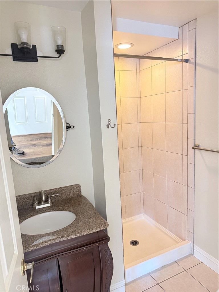 1025 Edith Avenue Alhambra, CA 91803 - Photo 4 of 11 a bathroom with a sink and a mirror
