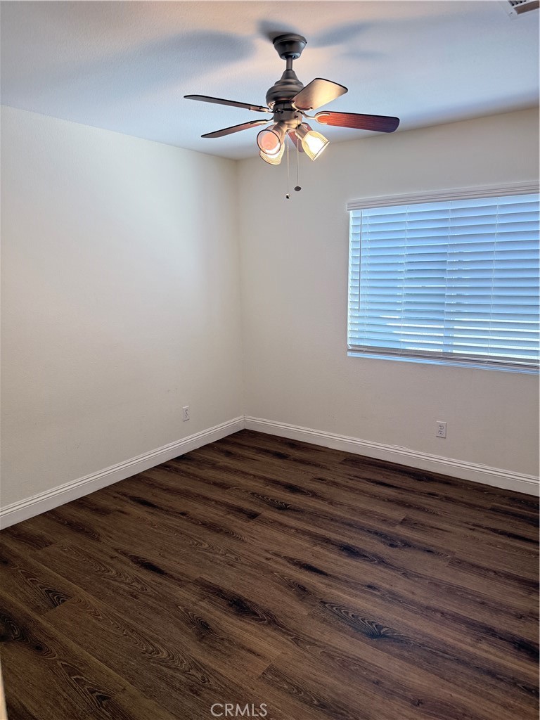 1025 Edith Avenue Alhambra, CA 91803 - Photo 10 of 11 a view of an empty room with wooden floor and a window