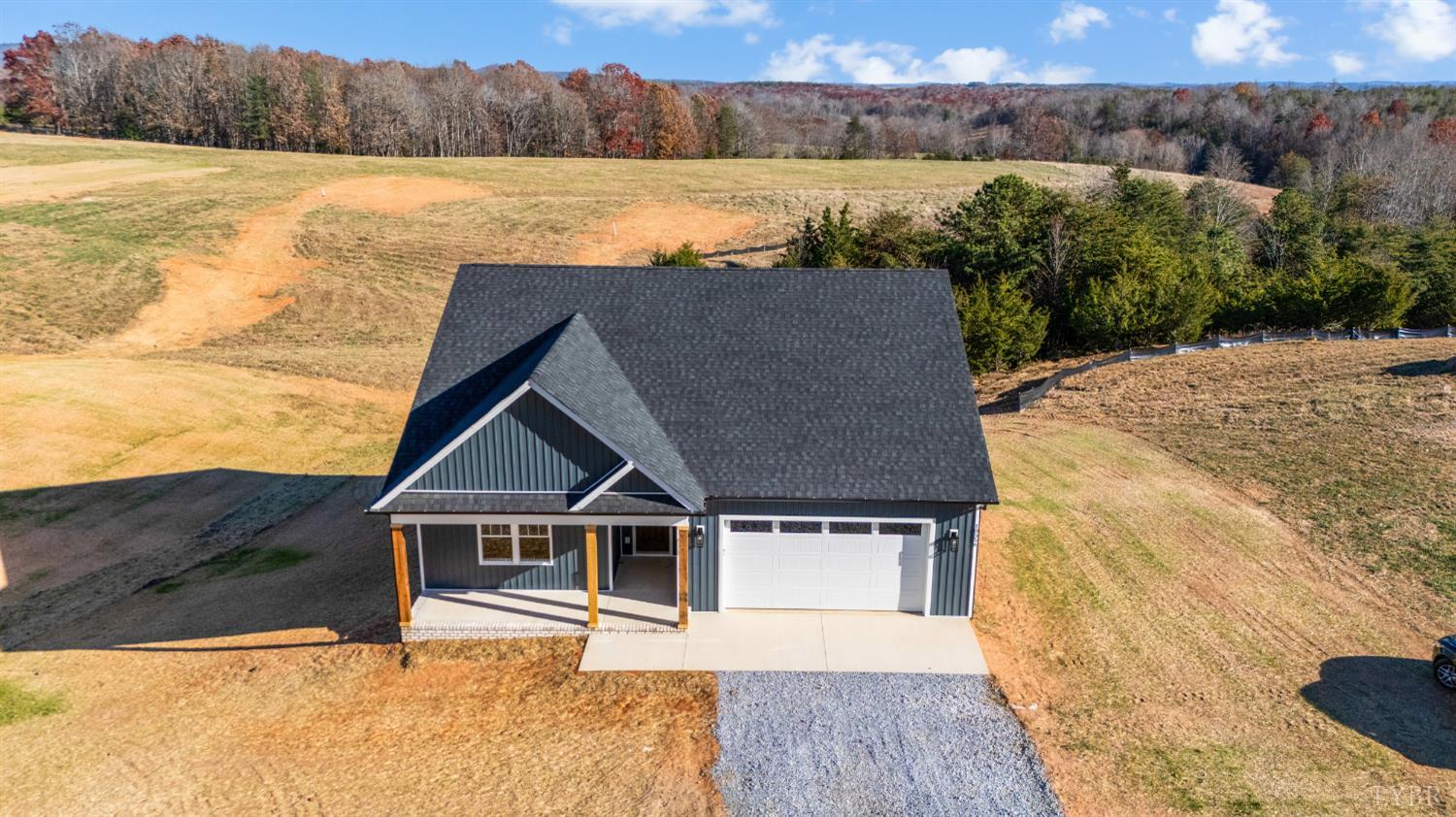 10556 Leesville Road Lynch Station, VA 24571 - Photo 1 of 64 a house with river in front of it