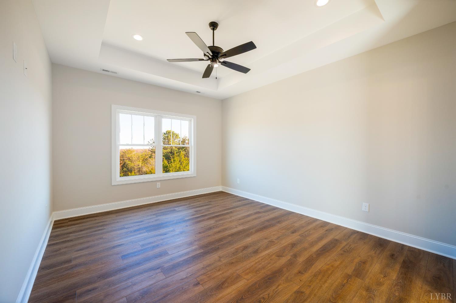 10556 Leesville Road Lynch Station, VA 24571 - Photo 29 of 64 wooden floor in an empty room with a window