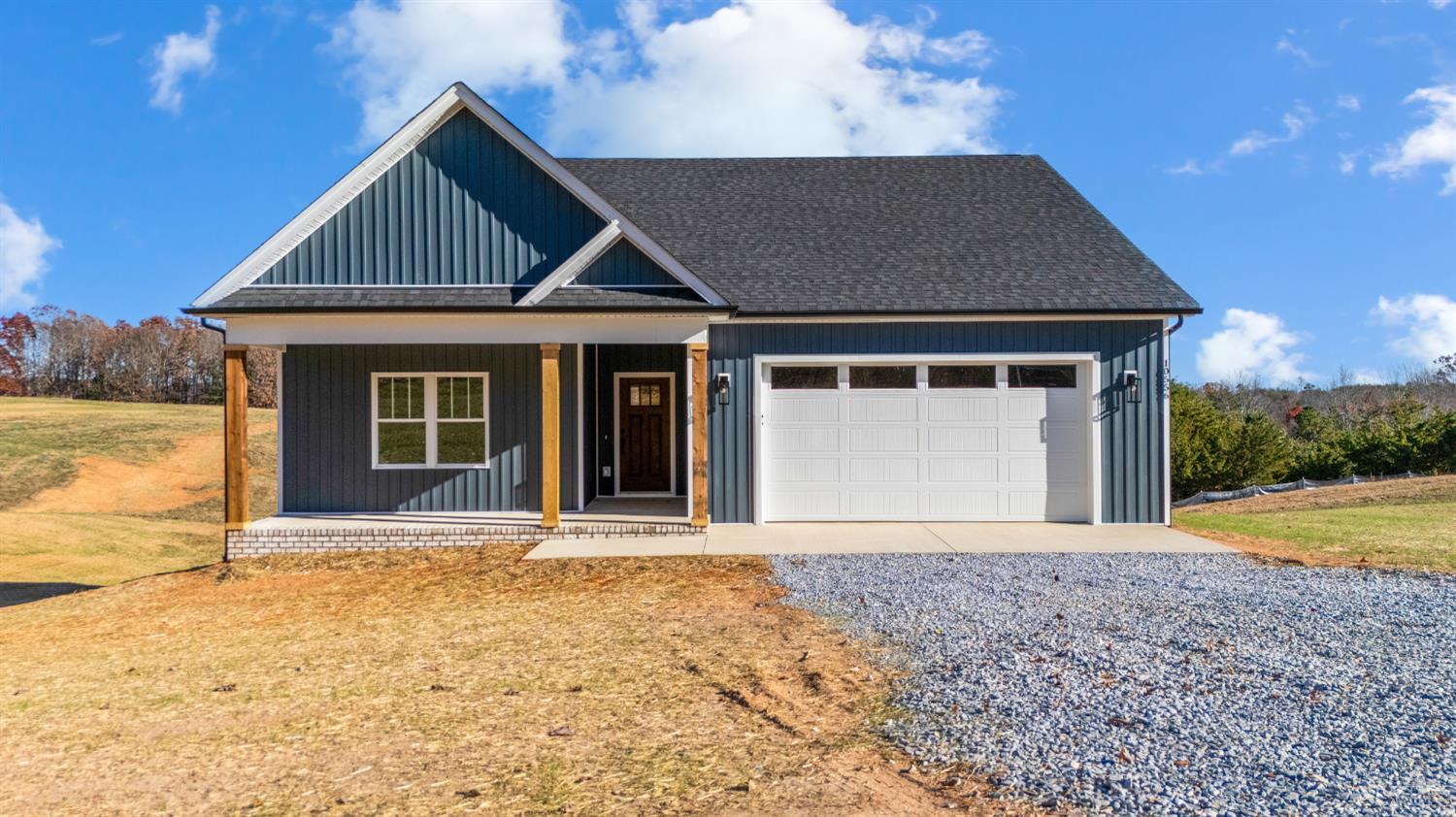 10556 Leesville Road Lynch Station, VA 24571 - Photo 48 of 64 a front view of a house with a yard and garage