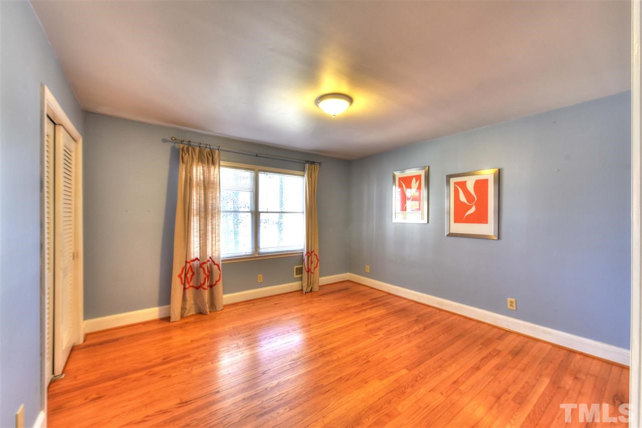 4217 Juniper Street Raleigh, NC 27612 - Photo 11 of 12 a view of an empty room with a window