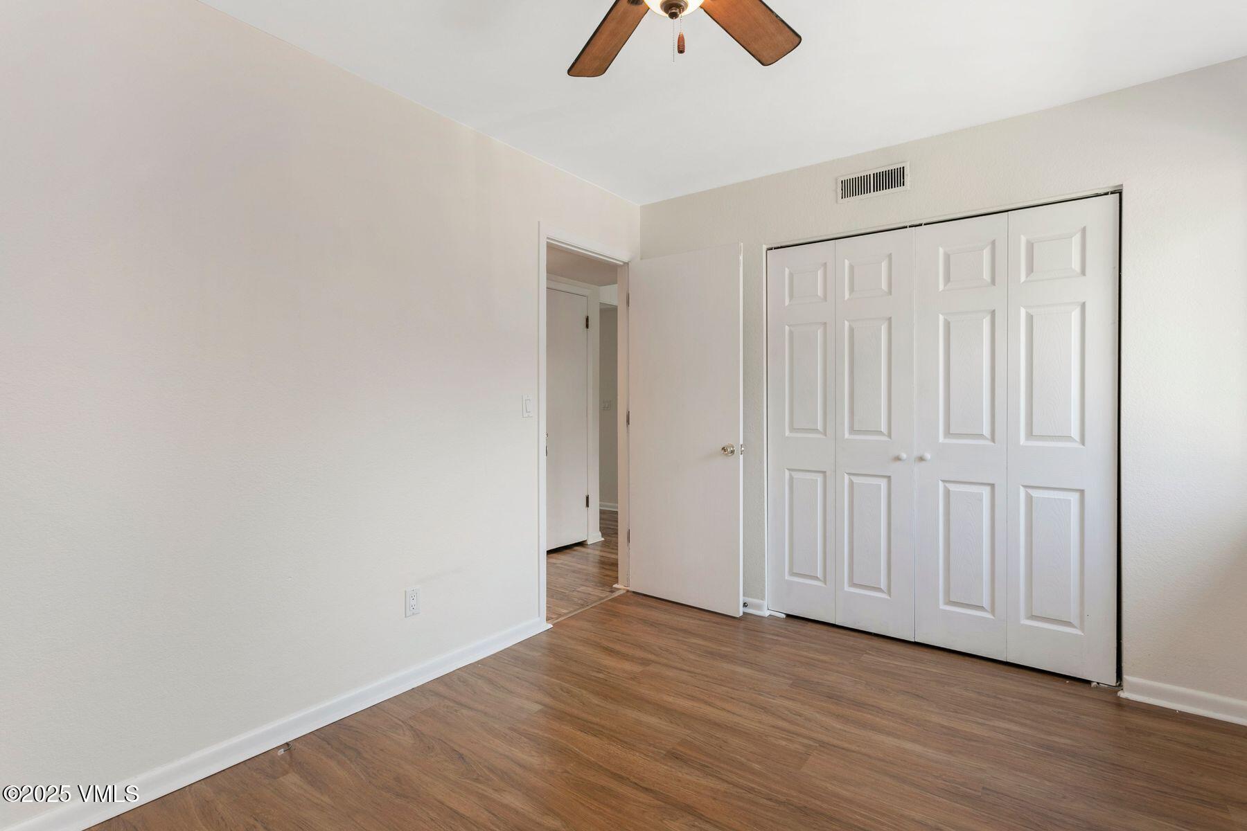 600 Price Lane, Unit 1 Gypsum, CO 81637 - Photo 16 of 26 wooden floor in an empty room