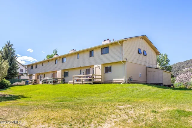a big house with a big yard and more windows