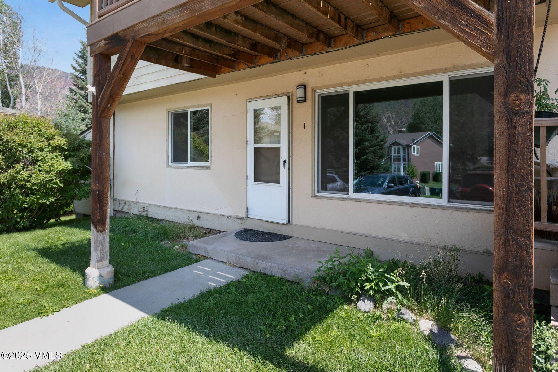 600 Price Lane, Unit 1 Gypsum, CO 81637 - Photo 22 of 26 a view of a porch of the house