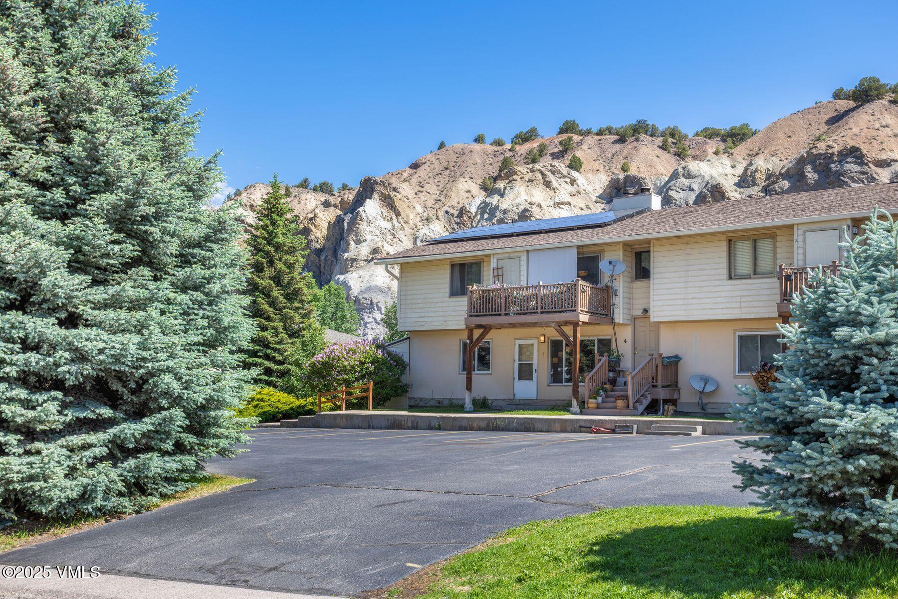600 Price Lane, Unit 1 Gypsum, CO 81637 - Photo 25 of 26 a front view of a house with garden