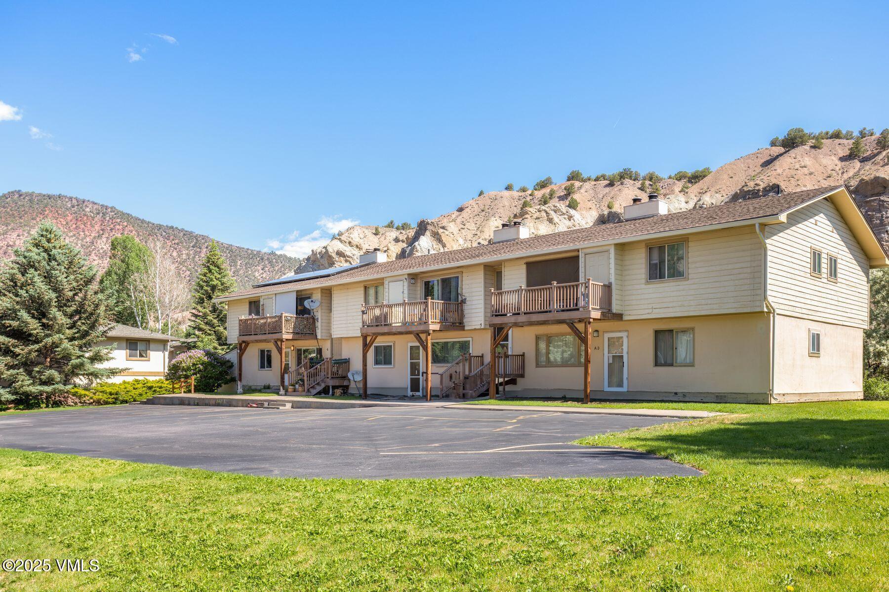 600 Price Lane, Unit 1 Gypsum, CO 81637 - Photo 26 of 26 a front view of a house with a yard