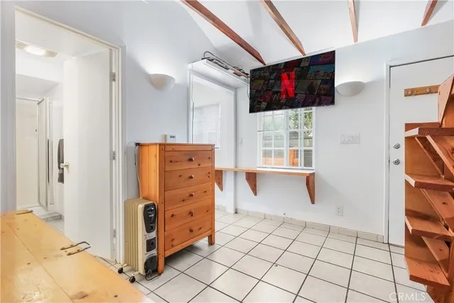 a bathroom with a shower and toilet