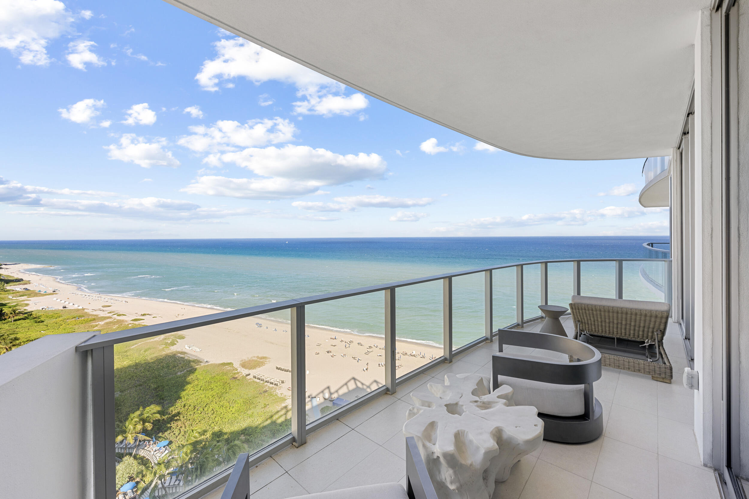 a balcony with view of ocean