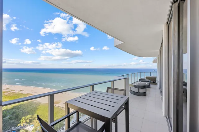 a view of an ocean and a building