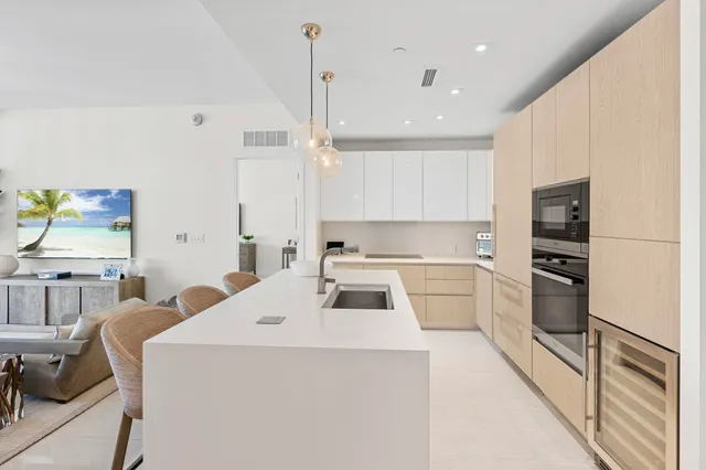 a kitchen that has a cabinets and a stove top oven