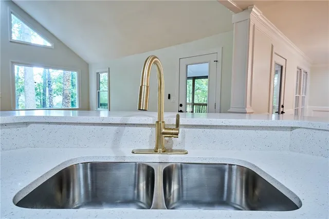 an aerial view of a house with a yard and outdoor space