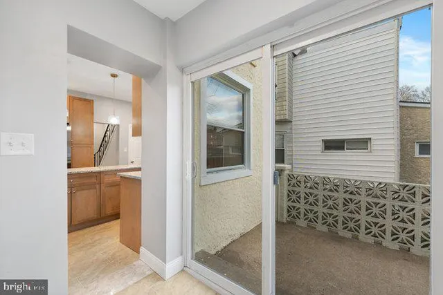 a bedroom with a large bed and a couch