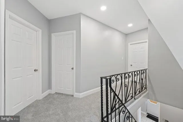 a view of pool with a lounge chairs