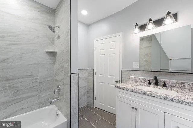 an aerial view of houses with outdoor space