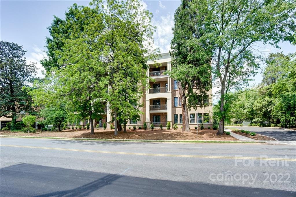 830 Providence Road, Unit 102 Charlotte, NC 28207 - Photo 2 of 31 a view of a building with a street