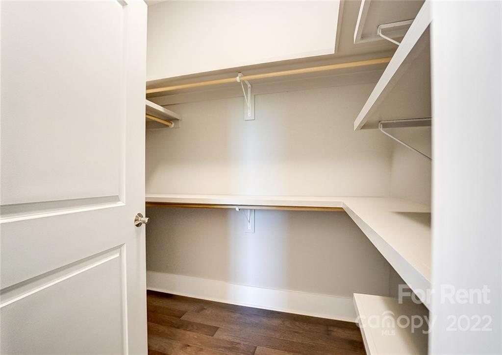 830 Providence Road, Unit 102 Charlotte, NC 28207 - Photo 26 of 31 a view of an empty walk in closet