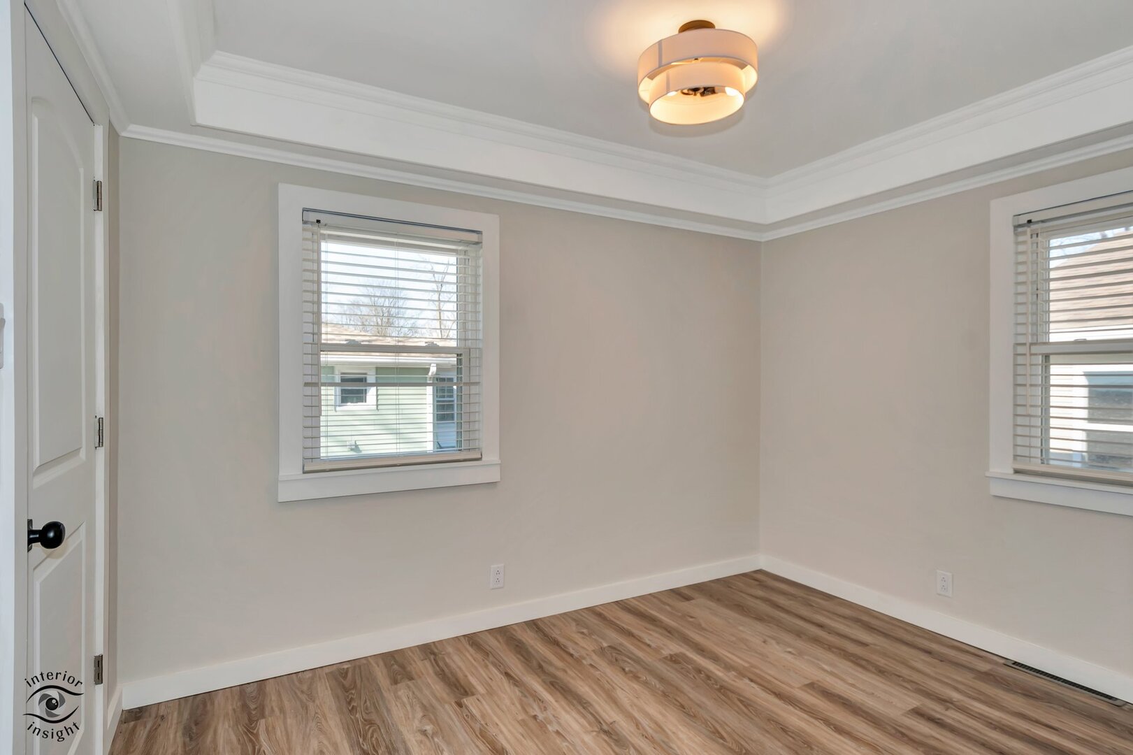 5101 East 1000 Road North Kankakee, IL 60901 - Photo 13 of 35 a view of an empty room with a window and wooden floor