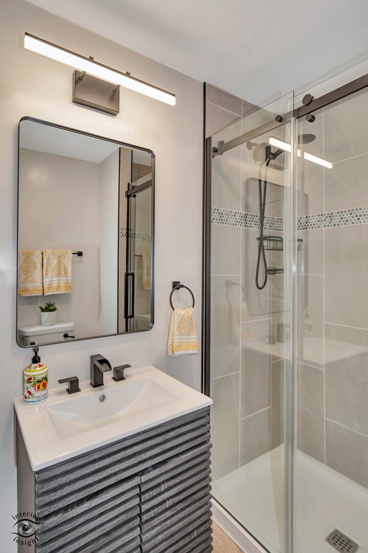 5101 East 1000 Road North Kankakee, IL 60901 - Photo 15 of 35 a bathroom with a sink mirror and shower