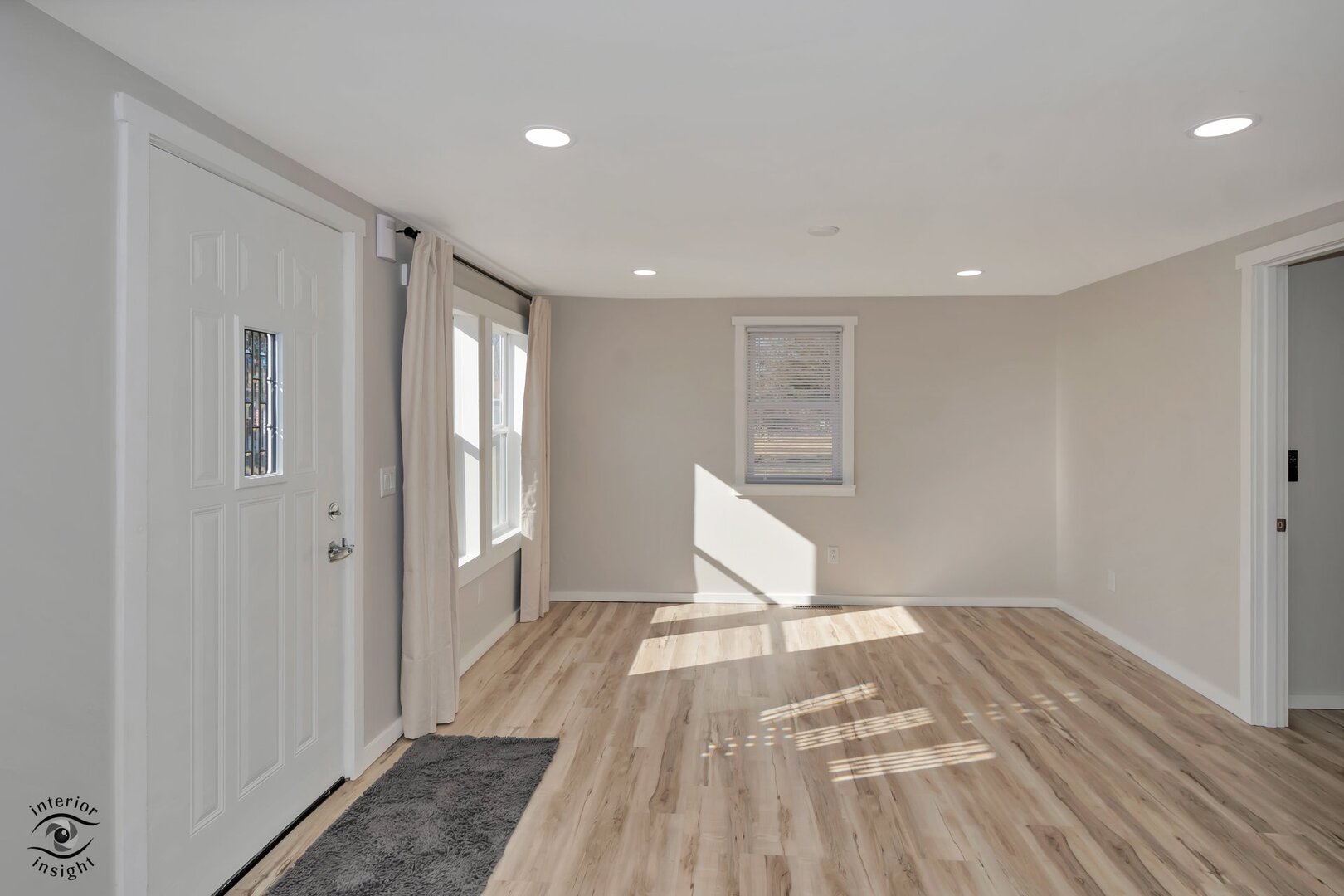 5101 East 1000 Road North Kankakee, IL 60901 - Photo 21 of 35 a view of a livingroom with wooden floor and a hallway