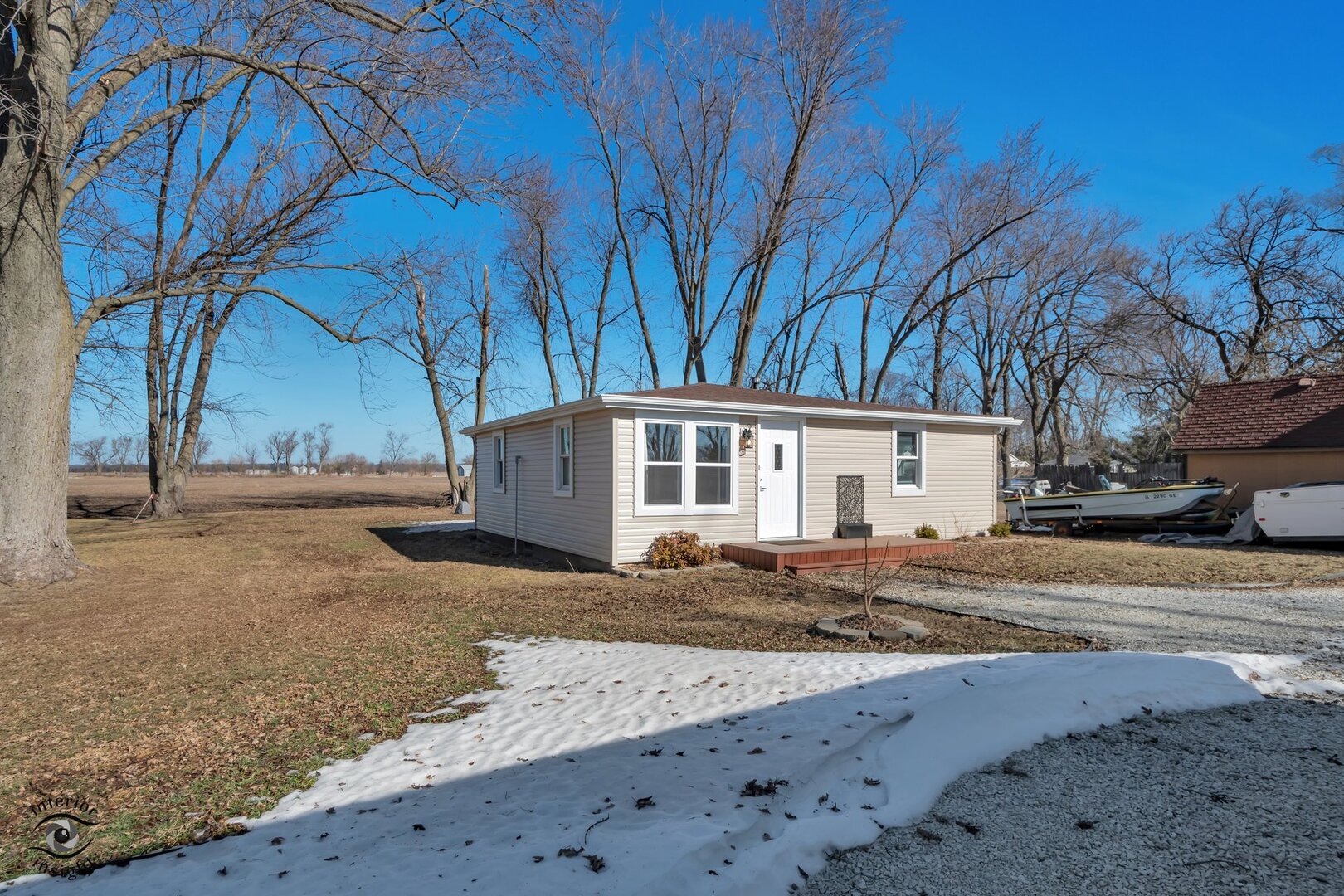 5101 East 1000 Road North Kankakee, IL 60901 - Photo 31 of 35 a view of a house with a yard covered in snow