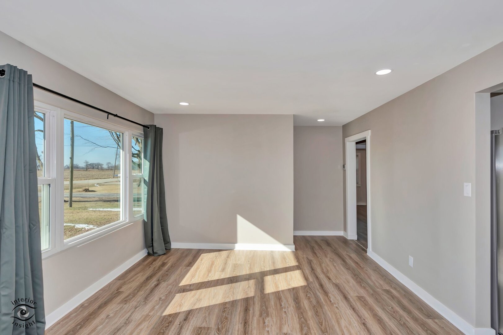 5101 East 1000 Road North Kankakee, IL 60901 - Photo 10 of 35 a view of an empty room with wooden floor and a window
