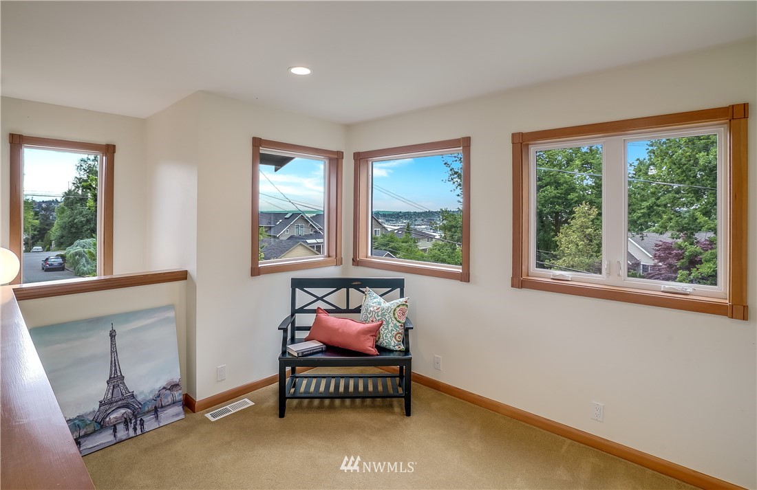 1023 West Ruffner Street Seattle, WA 98119 - Photo 14 of 25 a room with furniture and a window