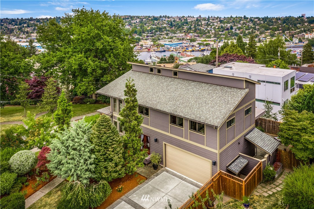 1023 West Ruffner Street Seattle, WA 98119 - Photo 24 of 25 an aerial view of a house with a garden