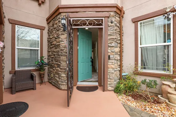 a front view of a house with outdoor space